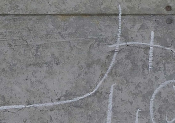 Image of chalk marks drawn by the engineer during visual checks